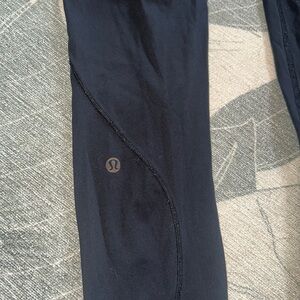 Lululemon legging - Sz 4. Used condition. Back zip pocket & internal drawstring.